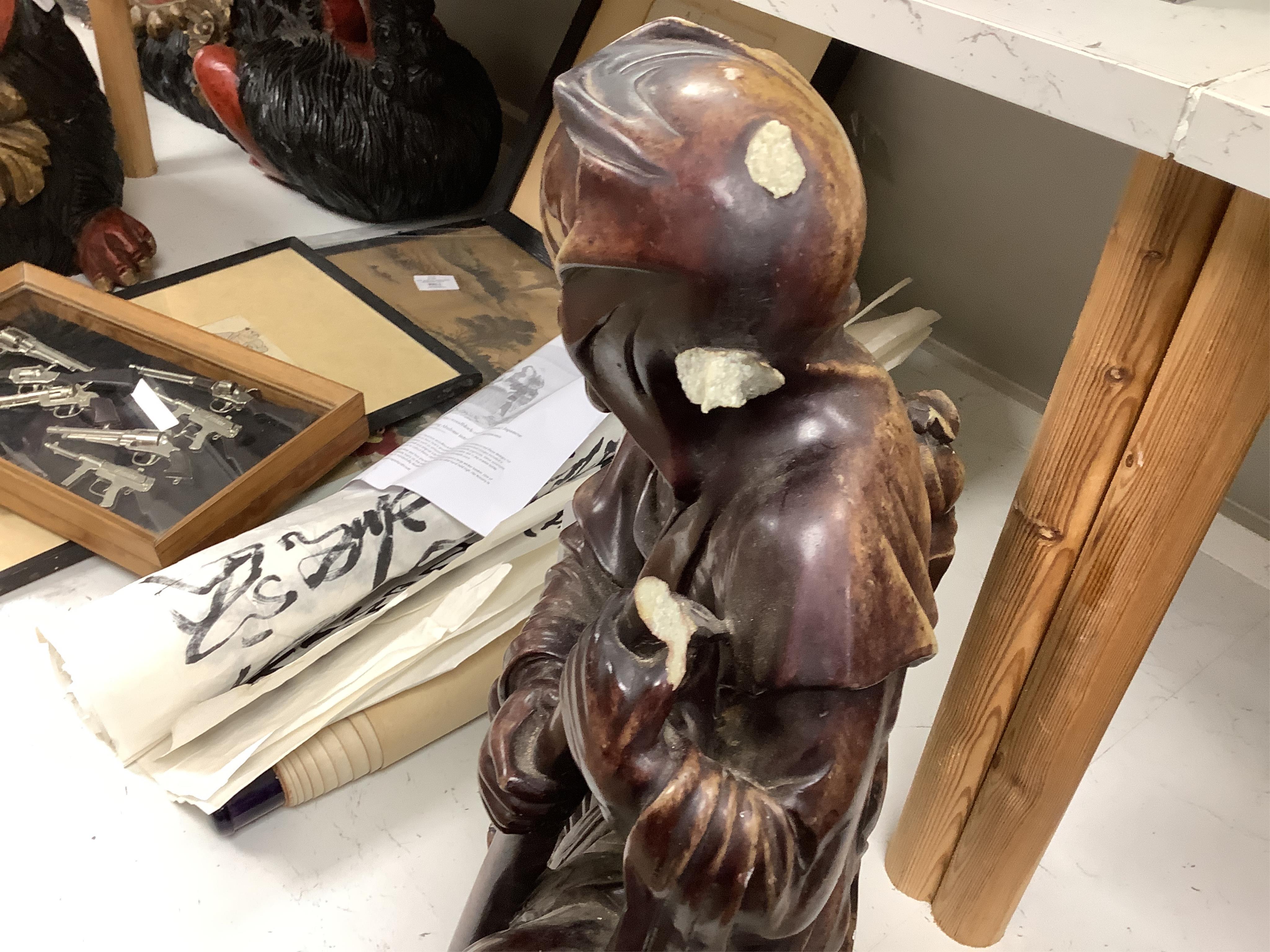 A large Chinese soapstone figure of an elder, 50cm high